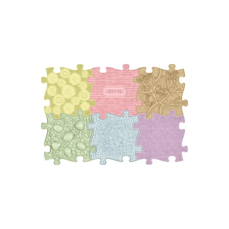 Pastelowe elementy mat sensorycznych Muffik ułożone obok siebie w zestawie Baby Set Pastel