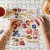 Zbliżenie na elementy puzzli Ziemniaki Bright Junior Media z kolorowymi grafikami ziemniaków