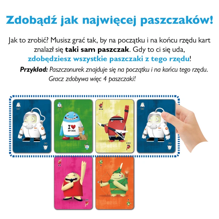 Karty gry Paszczaki ułożone na stole podczas rozgrywki