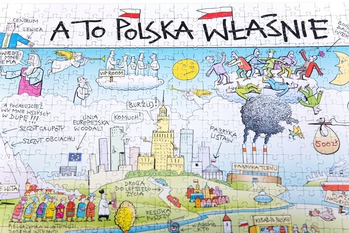 Widok części ułożonych puzzli A to Polska właśnie z ilustracją Andrzeja Mleczki