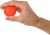 Zbliżenie na MoVeS Squeeze Ball z widoczną fakturą powierzchni, używana podczas ćwiczeń dłoni i treningu chwytu
