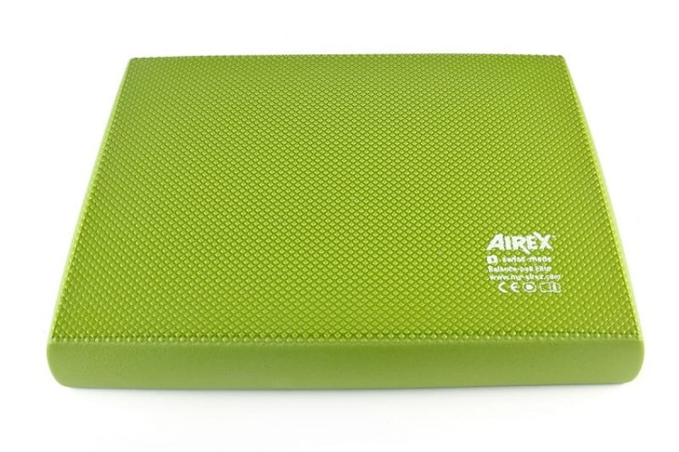Airex Balance-pad Elite przedstawiona w aranżacji sali rehabilitacyjnej z oznaczeniem stref ćwiczeń