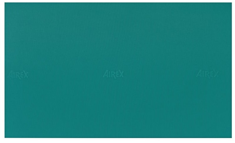 Zbliżenie na strukturę powierzchni maty Airex Atlas, przydatne do oceny tekstury i komfortu podczas ćwiczeń terapeutycznych