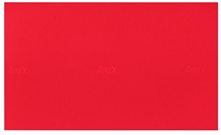 Widok boku maty rehabilitacyjnej Airex Atlas, prezentujący krawędź i sposób leżenia na podłożu podczas ćwiczeń