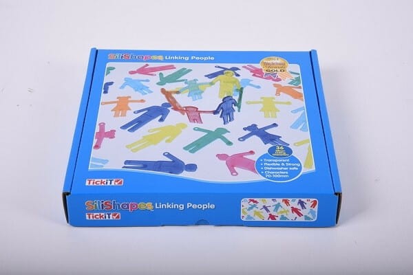 Figurki SiliShapes ułożone na stoliku świetlnym w układzie edukacyjnym, pokazujące zastosowanie w terapii