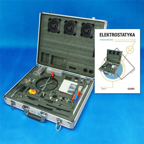 Widok otwartej aluminiowej walizki z zestawem do elektrostatyki; widać przyrządy, przegródki i ochronną gąbkę wewnątrz