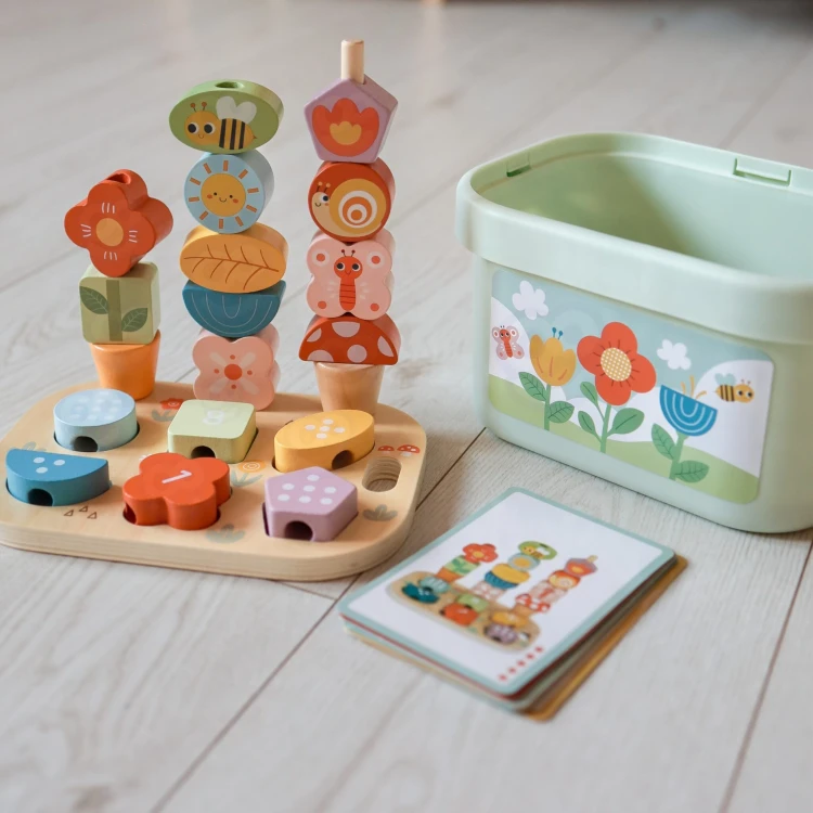Układanka i sorter Magiczny Ogród TOOKY TOY — drewniane elementy wspierające logiczne myślenie i poznawanie kształtów