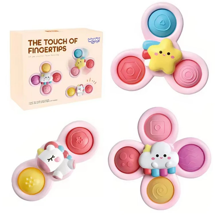 Kosmiczny Spinner Pop-it WOOPIE BABY — zbliżenie różowego elementu z motywem jednorożca i przyssawką