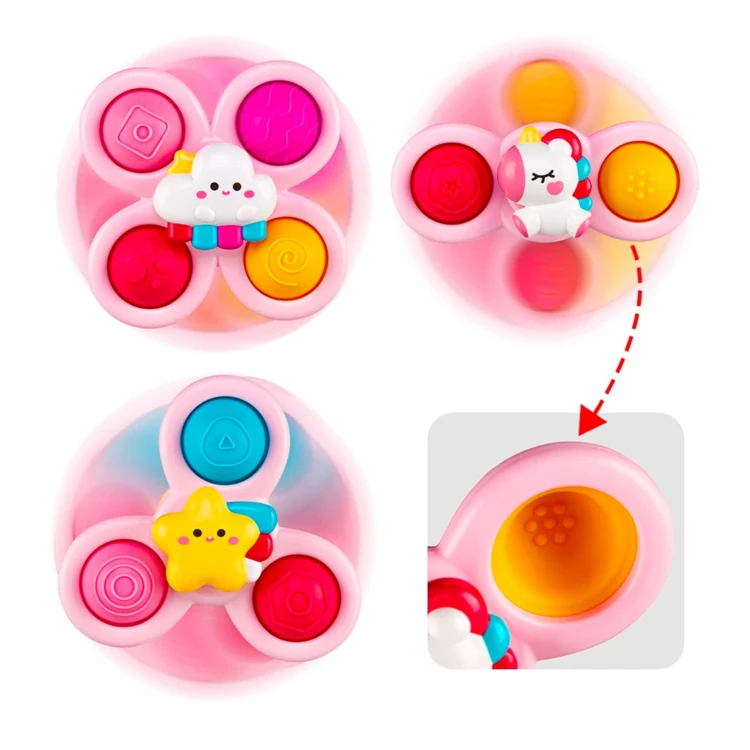 Różowy spinner Pop-it WOOPIE BABY zamocowany przyssawką na szybie samochodu, widok profilowy