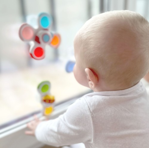 Kolorowe spinnerki WOOPIE BABY — widok z boku pokazujący kształt rakiety, kosmity i UFO