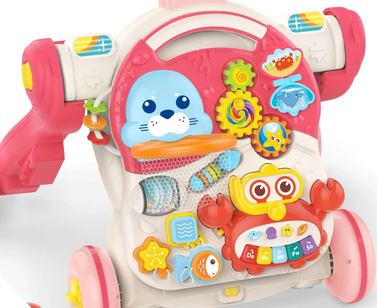 Zbliżenie na ruchome elementy WOOPIE BABY 4w1 — koraliki i przekładki pomagające ćwiczyć motorykę