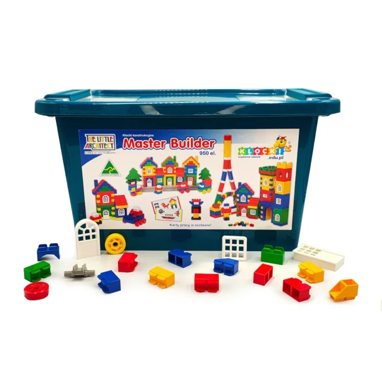Komplet 950 elementów Master Builder ułożonych częściowo w pudełku i na stole, pokazujący różnorodność kształtów i kolorów.