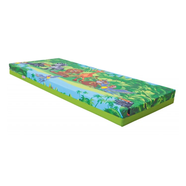 Widok materaca i leżanki 2w1 60 x 140 cm z góry, pokazujący bawełniany wierzch i kształt produktu w kontekście kącika wypoczynkowego