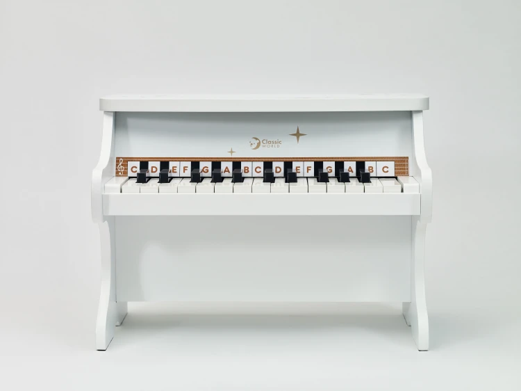 Kolorowe oznaczenia klawiszy pianina CLASSIC WORLD — zbliżenie ułatwiające naukę melodii
