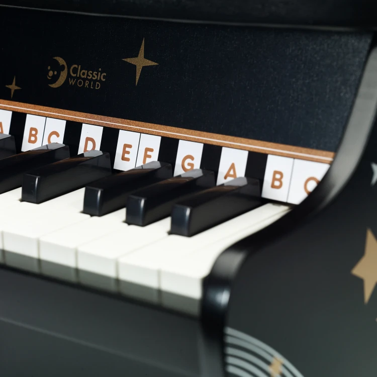 Klawisze pianina CLASSIC WORLD w ruchu — uchwycony moment naciśnięcia i mechanika działania