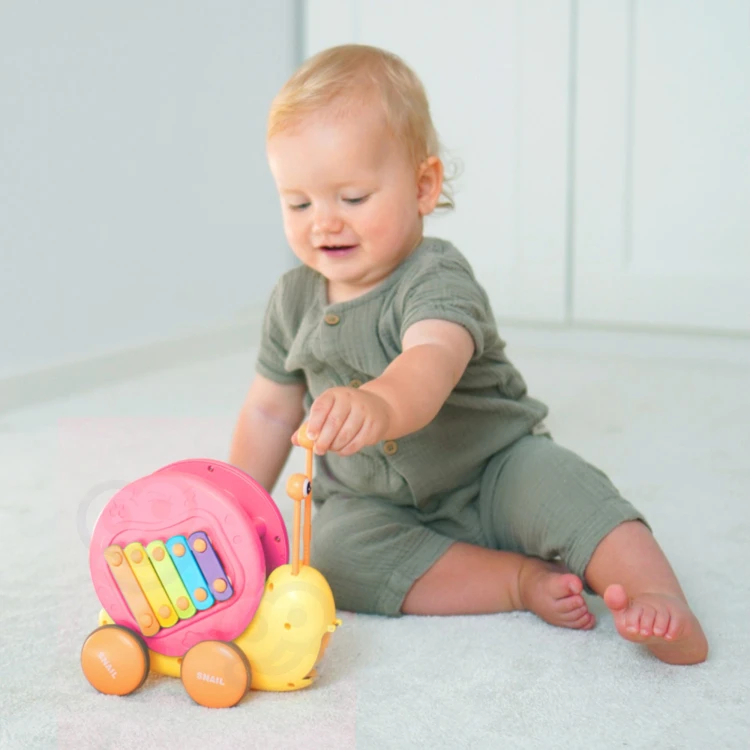 Zębatki sensoryczne WOOPIE — kolorowe koła zębate sfotografowane z boku, mechanizm ruchu