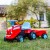 Detal kół jeździka Traktor Go! — solidne koła i oś, czerwony akcent i widoczna konstrukcja marki FALK