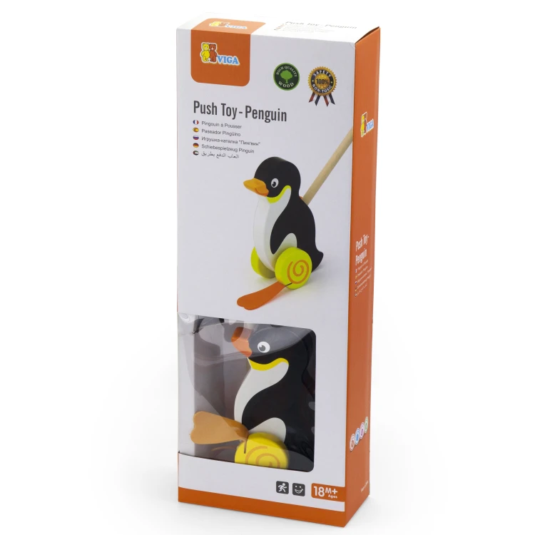 Pchacz pingwin VIGA TOYS ustawiony na podłodze — prezentacja stabilności i starannych, drewnianych wykończeń zabawki