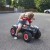 Zbliżenie kierownicy i kokpitu jeździka Bobby Quad Racing BIG — detale sterowania i wygodny uchwyt