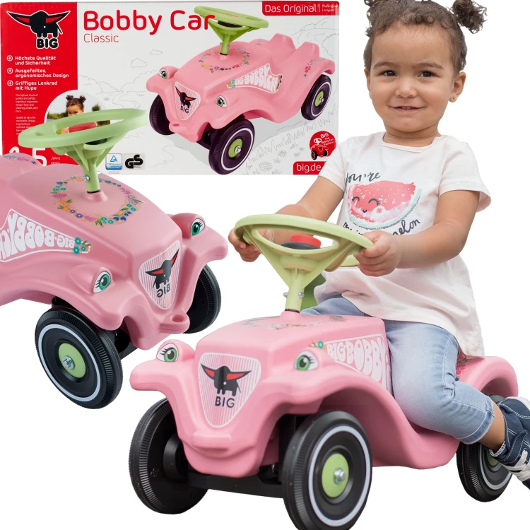 BIG Jeździk Bobby Car Classic Flower różowy — widok z boku na siedzenie, kierownicę i przednie koła