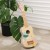 Widok z boku drewnianego ukulele dla dzieci CLASSIC WORLD — profil pudła i szyjki instrumentu w różowym odcieniu