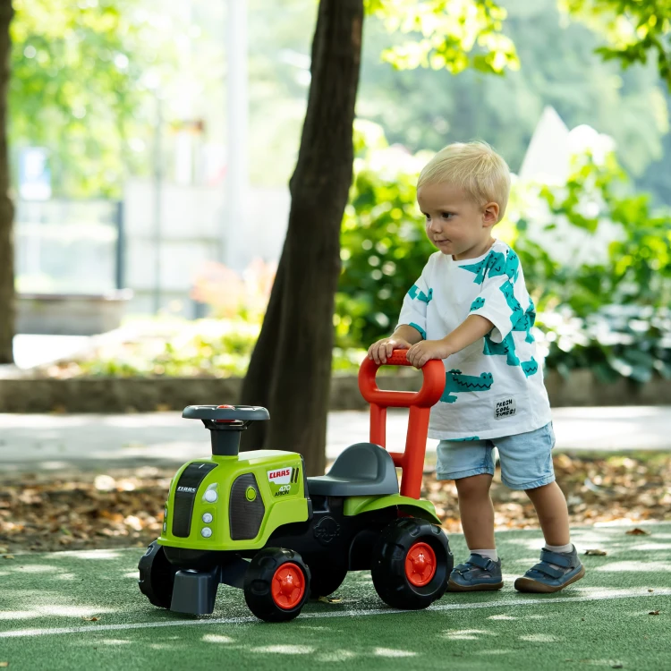 Widok od tyłu — pchacz FALK z uchwytem i siedziskiem, widoczny mechanizm podpory tylnej