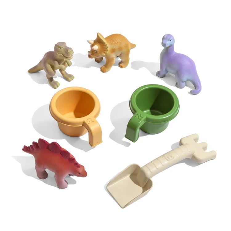 Dziecko bawi się przy stole wodnym Park Dinozaurów Step 2 — fontanna i zabawki w ogrodzie