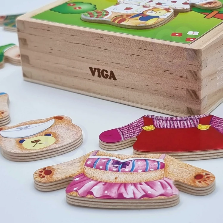 Zbliżenie na kolorowe części puzzle VIGA 89 — detale tkanin i gładkich krawędzi elementów