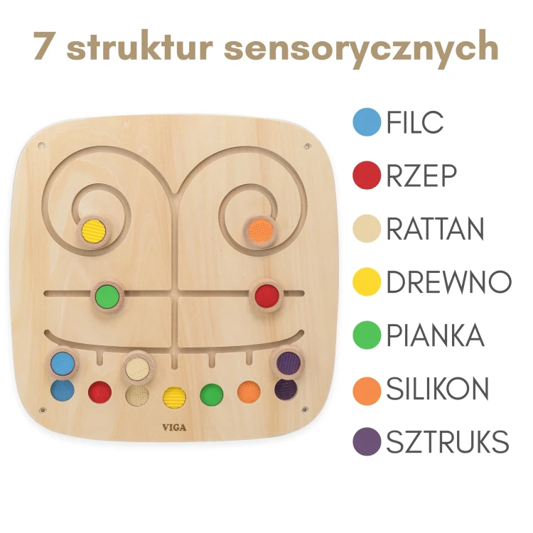Ujęcie z perspektywy dziecka na powierzchnię manipulacyjną VIGA 89 z torami dotykowymi