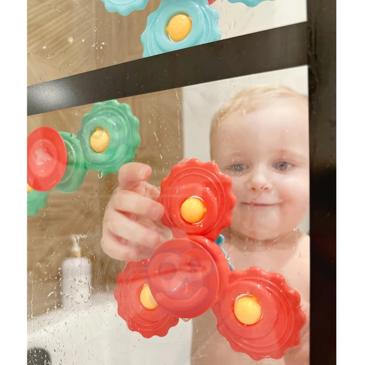 Zbliżenie na przyssawkę gryzaka Spinner WOOPIE BABY 88 — widoczna struktura i mocowanie elementu