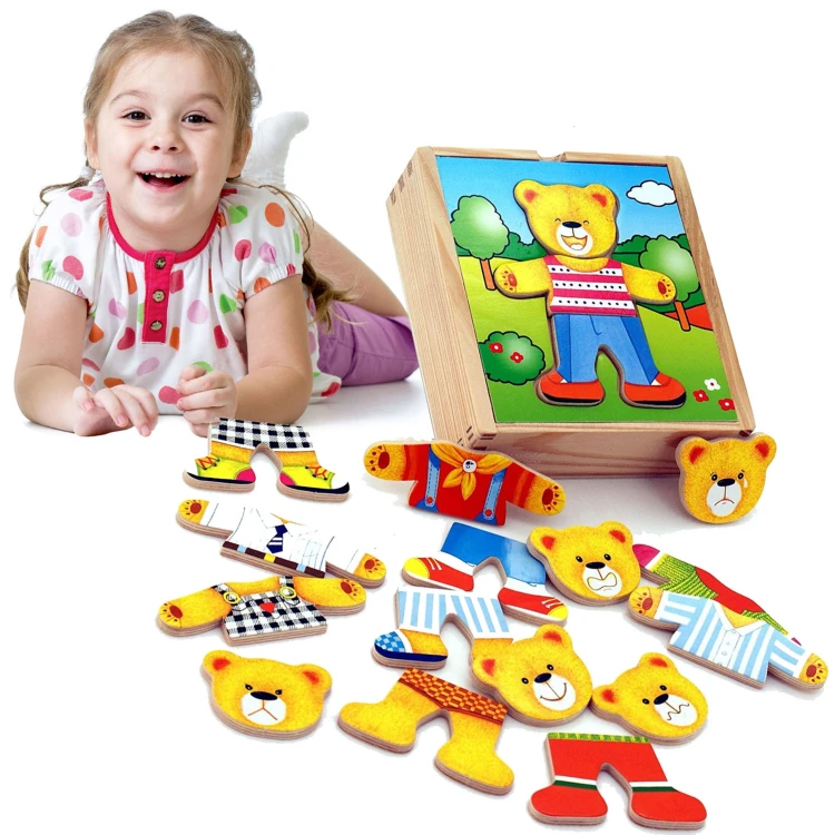 Ubierz Misia — drewniane puzzle edukacyjne VIGA, widok z góry na misia i kolorowe ubranka