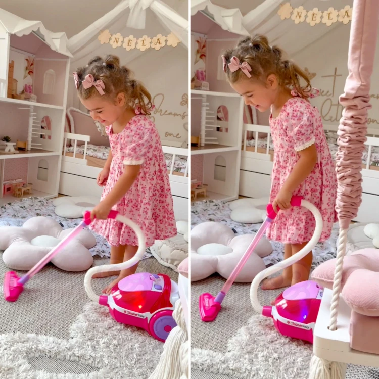 Panel sterowania odkurzacza WOOPIE znad góry — przyciski i ozdobne detale w różowej obudowie uchwycone z bliska