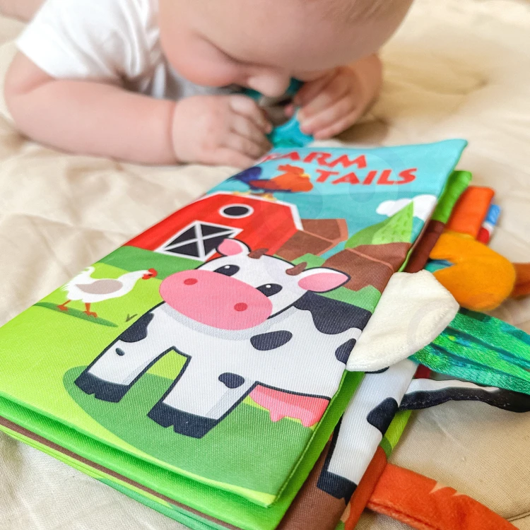 Tył książeczki materiałowej WOOPIE BABY 88 — metki i kolorystyka przeznaczona dla niemowląt