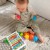 Klocki sensoryczne WOOPIE BABY na białym tle, miękkie i twarde elementy