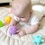 Ujęcie prezentuje możliwość dopasowywania i nakładania elementów z zestawu WOOPIE BABY 6 el. podczas zabawy