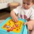 Zbliżenie na obrotowe i przesuwne elementy kostki 6w1 WOOPIE BABY — detale edukacyjne w stylu Montessori