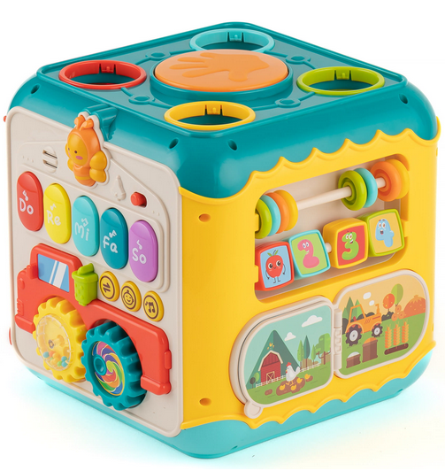 Przykład zabawy z kostką Montessori WOOPIE BABY — dziecko bawi się manipulując kolorowymi modułami 6w1