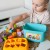 Zbliżenie na rączkę walizki i mechanizm zamykania — detal konstrukcji sorter WOOPIE BABY