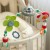 Mechanizm mocowania do szczebelków łóżeczka — stabilne zapięcie pałąka WOOPIE BABY, widok detaliczny