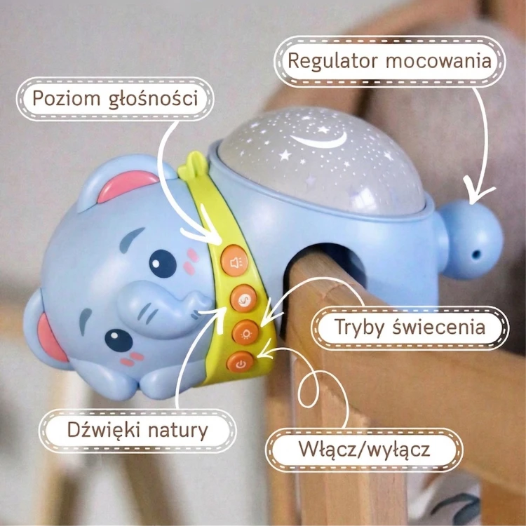 Aranżacja pokoju z projektorem gwiazd WOOPIE BABY — lampa nocna w naturalnym oświetleniu na komodzie