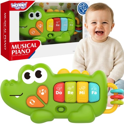 Interaktywne pianinko Krokodyl Woopie Baby z kolorowymi klawiszami i wygodnym uchwytem do ćwiczeń manualnych