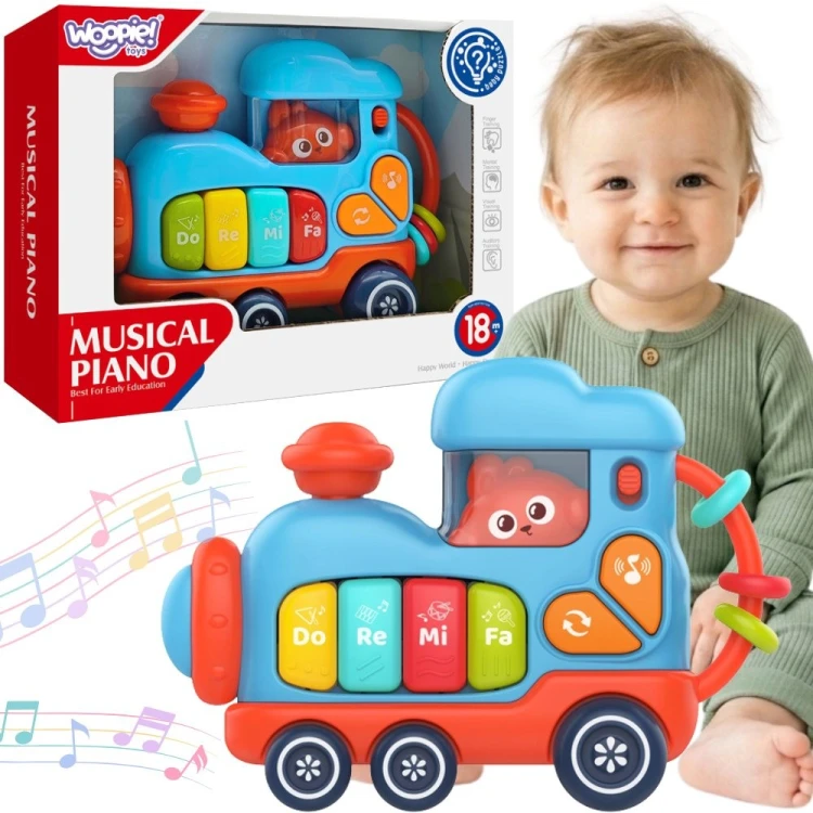 Muzyczne pianinko lokomotywa Woopie Baby z kolorowymi klawiszami i ergonomicznym uchwytem dla dzieci