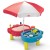 Little Tikes piaskownica-wodny stół dla dzieci — widok z góry z kolorowymi misami i wbudowanymi schowkami