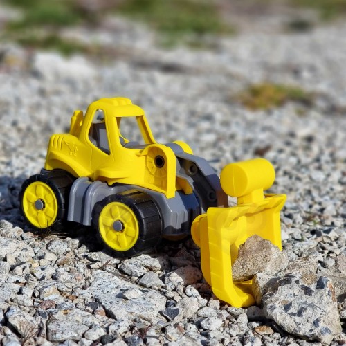 Detal łyżki i zawiasów — boczny widok mini ładowarki BIG Power Worker 54 podczas podnoszenia i opuszczania