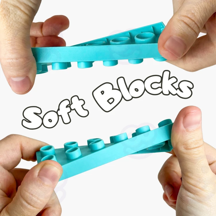 Elementy klocków Soft Blocks ustawione w stos — pokaz stabilności i różnorodnych kształtów WOOPIE