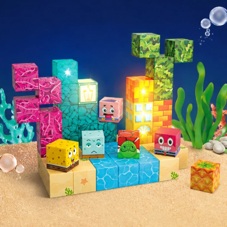 Dziecko bawiące się klockami magnetycznymi Woopie z motywem oceanu