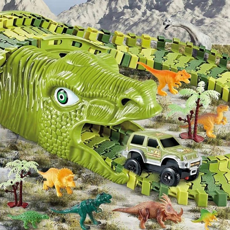 Scena zabawy z torem WOOPIE — ułożona trasa na podłodze, widoczne motywy dinozaurów i zakręty