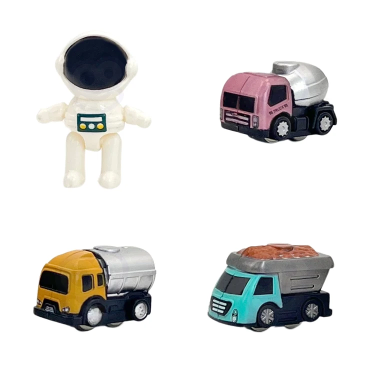 Elementy dekoracyjne toru WOOPIE — naklejki z planetami i grafika nawiązująca do przygody astronauty