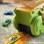 Pojazd wjeżdżający do sekcji 'Pożeracz' — dynamiczna scena z zestawu WOOPIE Tor Dinozaur