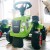Widok z tyłu traktorka Baby Claas FALK z przyczepką — kąt eksponujący tylne koła, zaczep i linię nadwozia